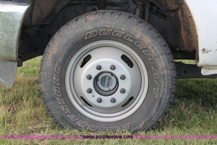 image for item K8912 2012 Ford F350  XL Super Duty Crew Cab flatbed pickup truck