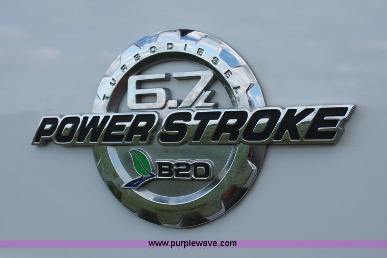 image for item K8912 2012 Ford F350  XL Super Duty Crew Cab flatbed pickup truck