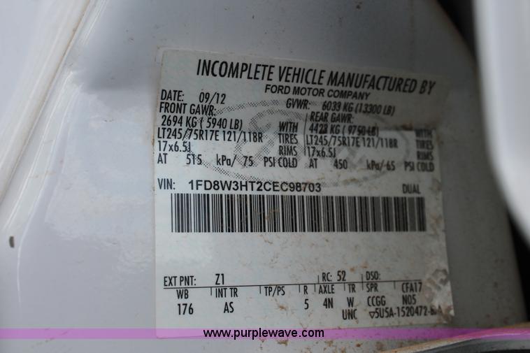 image for item K8912 2012 Ford F350  XL Super Duty Crew Cab flatbed pickup truck