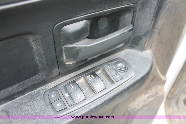 image for item K8913 2014 Dodge Ram 3500HD Quad Cab flatbed pickup truck