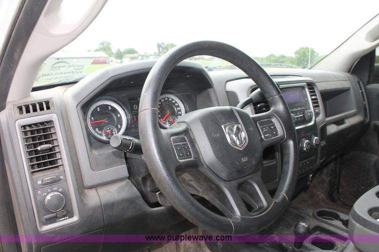 image for item K8913 2014 Dodge Ram 3500HD Quad Cab flatbed pickup truck