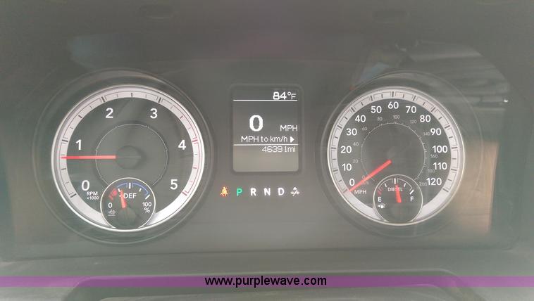 image for item K8913 2014 Dodge Ram 3500HD Quad Cab flatbed pickup truck