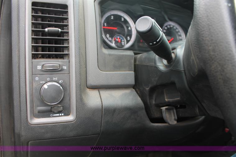 image for item K8913 2014 Dodge Ram 3500HD Quad Cab flatbed pickup truck