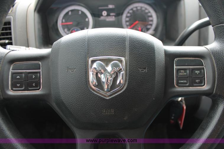 image for item K8913 2014 Dodge Ram 3500HD Quad Cab flatbed pickup truck