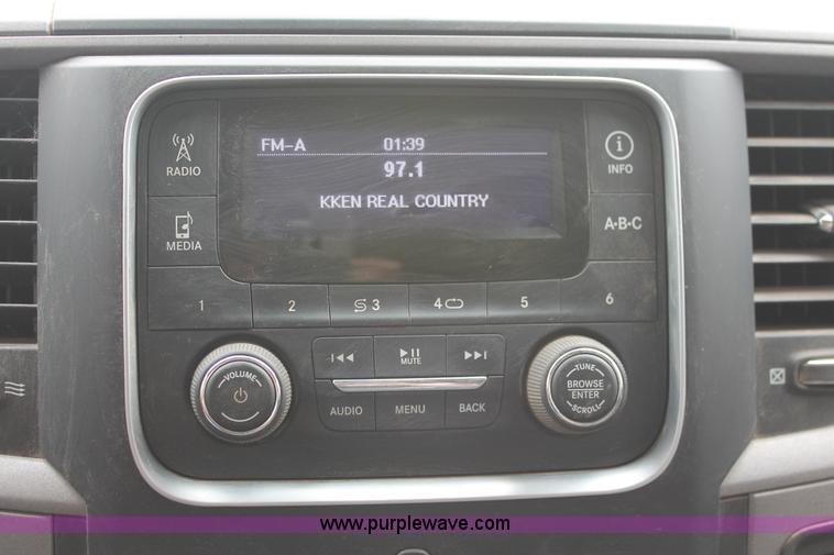 image for item K8913 2014 Dodge Ram 3500HD Quad Cab flatbed pickup truck