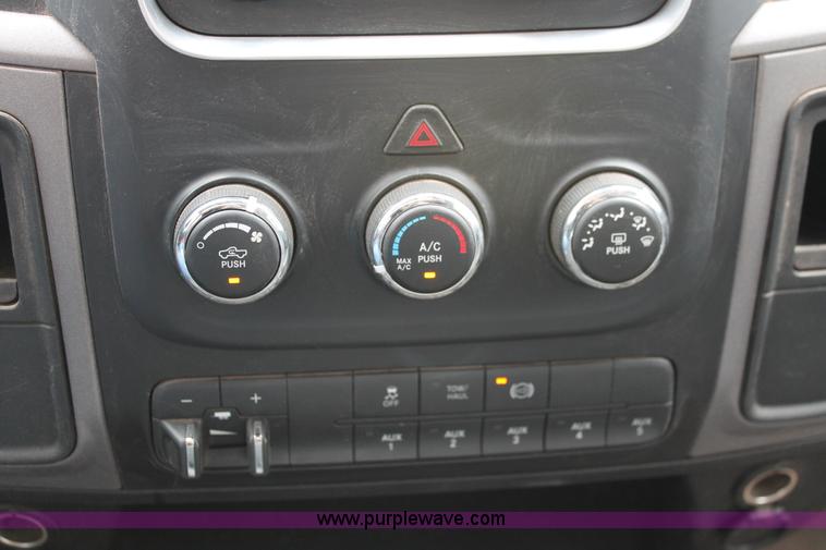 image for item K8913 2014 Dodge Ram 3500HD Quad Cab flatbed pickup truck