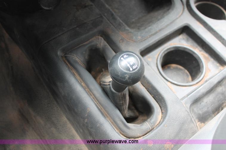 image for item K8913 2014 Dodge Ram 3500HD Quad Cab flatbed pickup truck