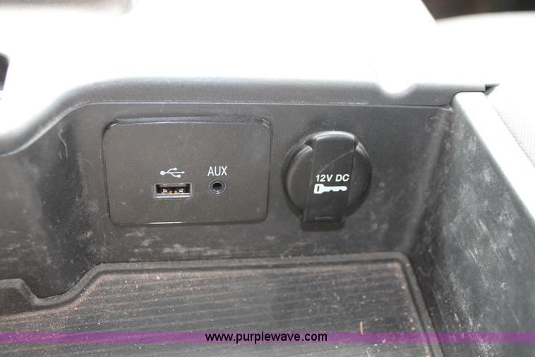 image for item K8913 2014 Dodge Ram 3500HD Quad Cab flatbed pickup truck