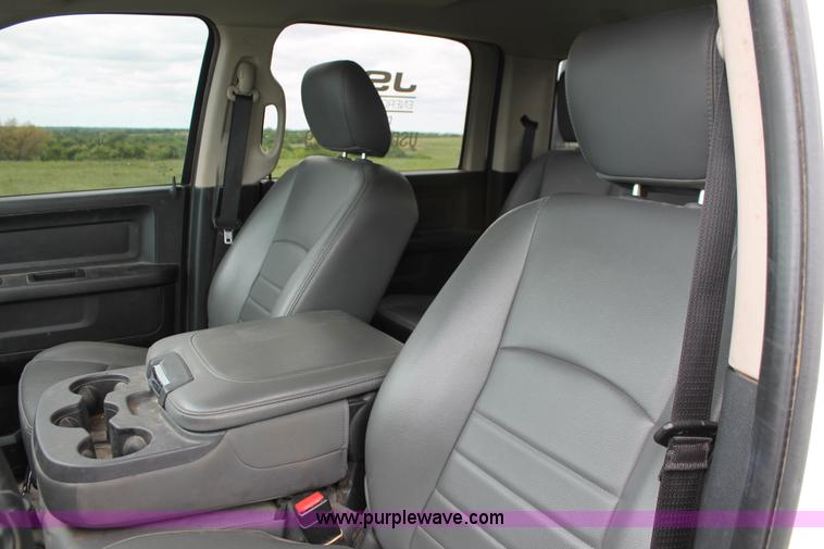 image for item K8913 2014 Dodge Ram 3500HD Quad Cab flatbed pickup truck