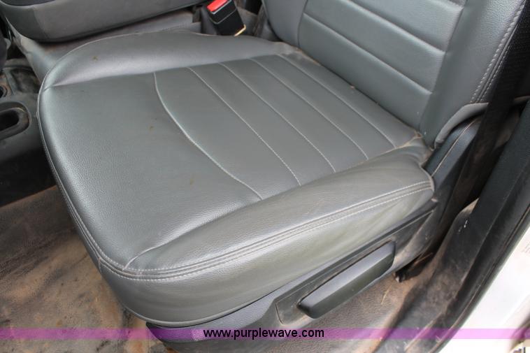 image for item K8913 2014 Dodge Ram 3500HD Quad Cab flatbed pickup truck