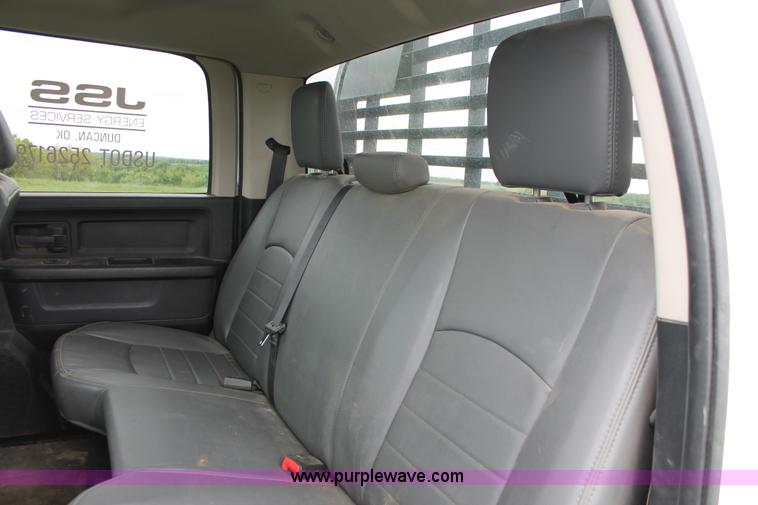image for item K8913 2014 Dodge Ram 3500HD Quad Cab flatbed pickup truck