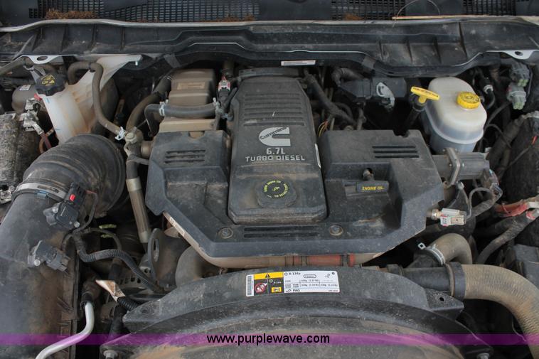 image for item K8913 2014 Dodge Ram 3500HD Quad Cab flatbed pickup truck