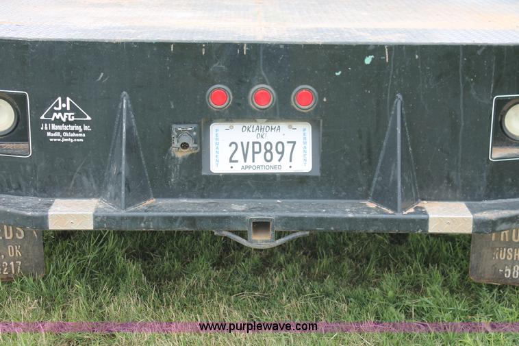 image for item K8913 2014 Dodge Ram 3500HD Quad Cab flatbed pickup truck