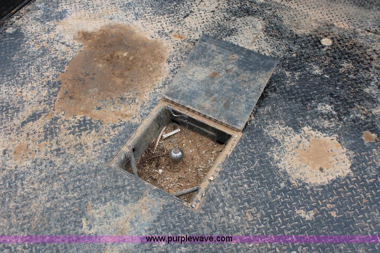 image for item K8913 2014 Dodge Ram 3500HD Quad Cab flatbed pickup truck