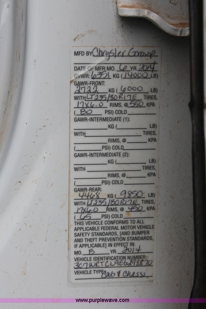 image for item K8913 2014 Dodge Ram 3500HD Quad Cab flatbed pickup truck