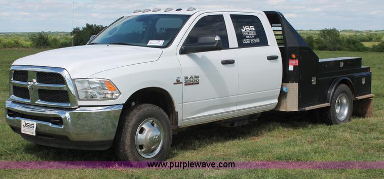 image for item K8914 2014 Dodge Ram 3500HD Quad Cab flatbed pickup truck