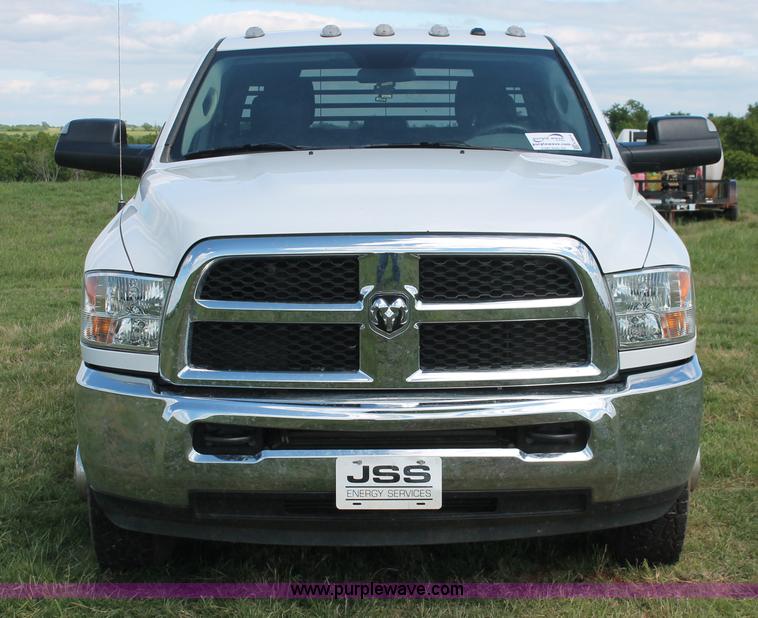 image for item K8914 2014 Dodge Ram 3500HD Quad Cab flatbed pickup truck