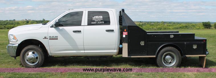 image for item K8914 2014 Dodge Ram 3500HD Quad Cab flatbed pickup truck