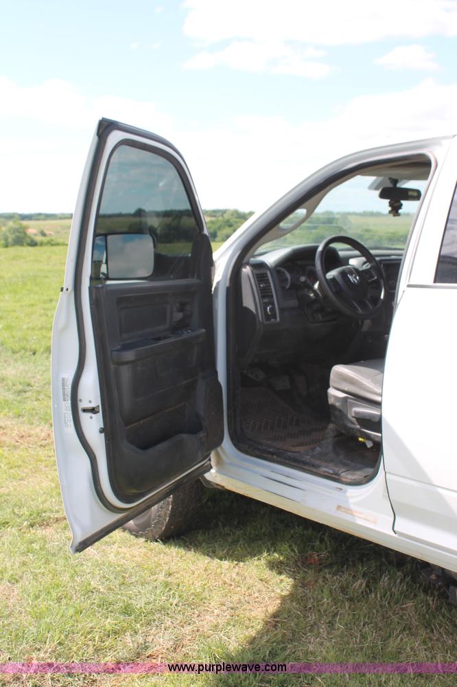 image for item K8914 2014 Dodge Ram 3500HD Quad Cab flatbed pickup truck