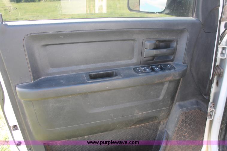 image for item K8914 2014 Dodge Ram 3500HD Quad Cab flatbed pickup truck