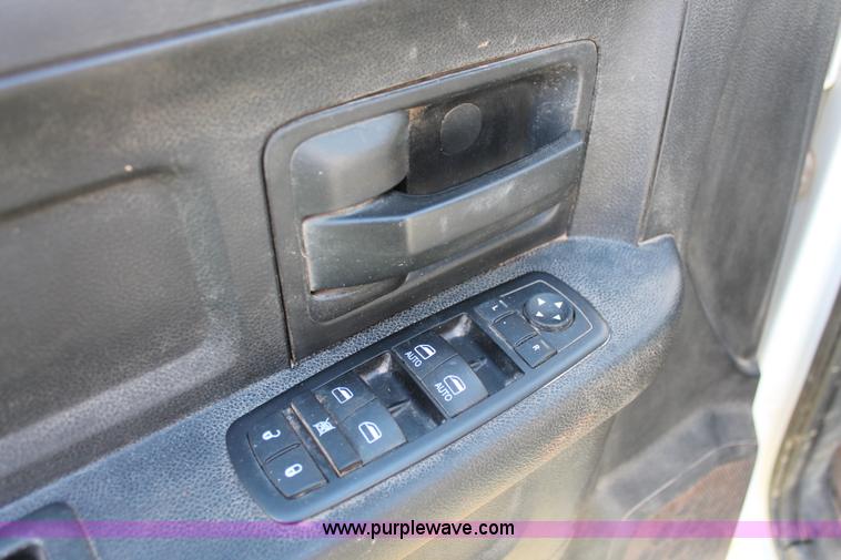 image for item K8914 2014 Dodge Ram 3500HD Quad Cab flatbed pickup truck