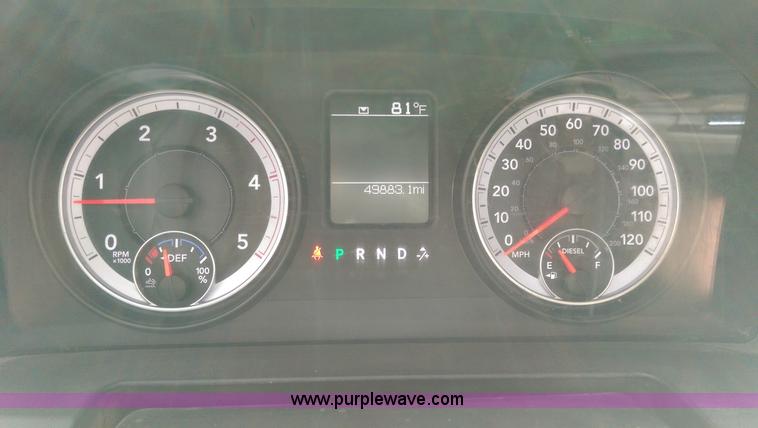 image for item K8914 2014 Dodge Ram 3500HD Quad Cab flatbed pickup truck