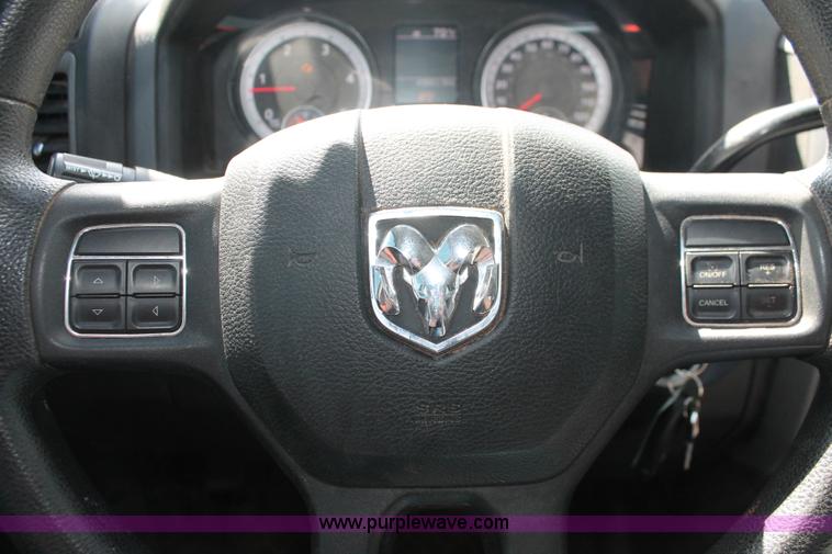 image for item K8914 2014 Dodge Ram 3500HD Quad Cab flatbed pickup truck