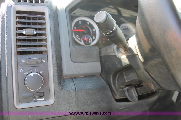 image for item K8914 2014 Dodge Ram 3500HD Quad Cab flatbed pickup truck