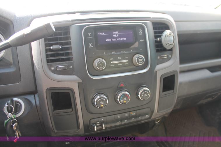 image for item K8914 2014 Dodge Ram 3500HD Quad Cab flatbed pickup truck