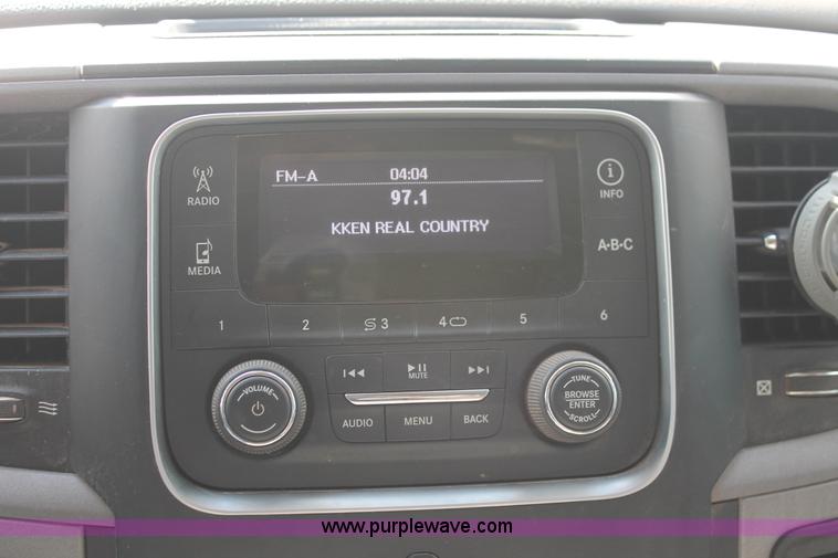 image for item K8914 2014 Dodge Ram 3500HD Quad Cab flatbed pickup truck