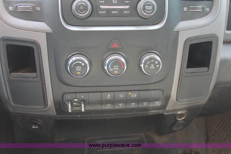 image for item K8914 2014 Dodge Ram 3500HD Quad Cab flatbed pickup truck