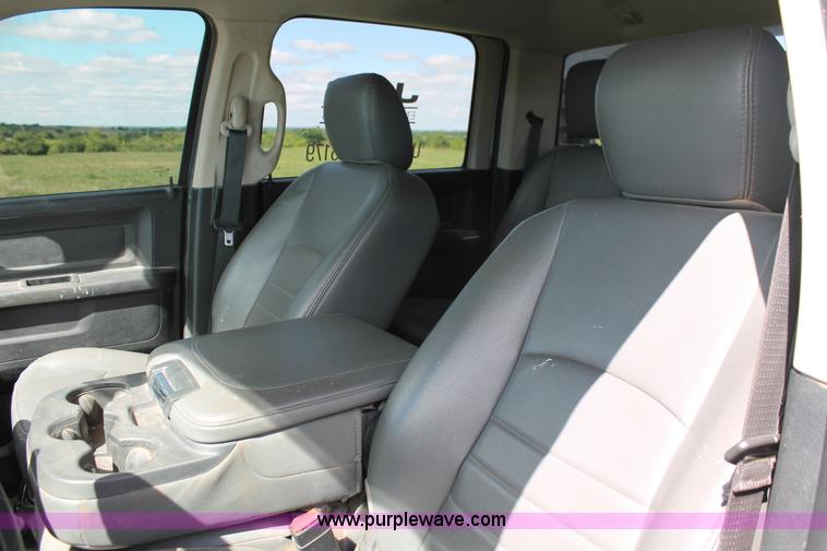 image for item K8914 2014 Dodge Ram 3500HD Quad Cab flatbed pickup truck