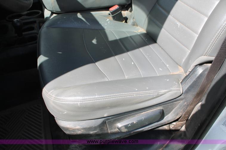 image for item K8914 2014 Dodge Ram 3500HD Quad Cab flatbed pickup truck