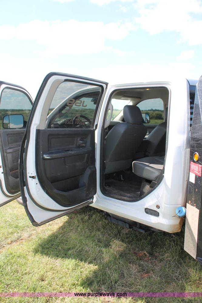 image for item K8914 2014 Dodge Ram 3500HD Quad Cab flatbed pickup truck