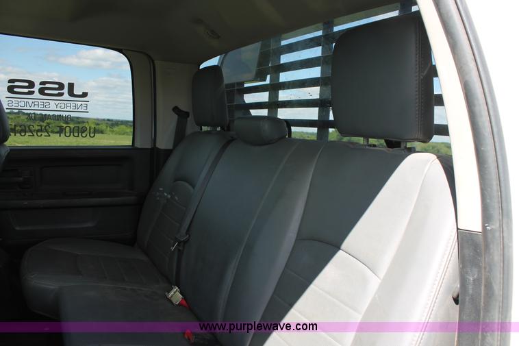 image for item K8914 2014 Dodge Ram 3500HD Quad Cab flatbed pickup truck