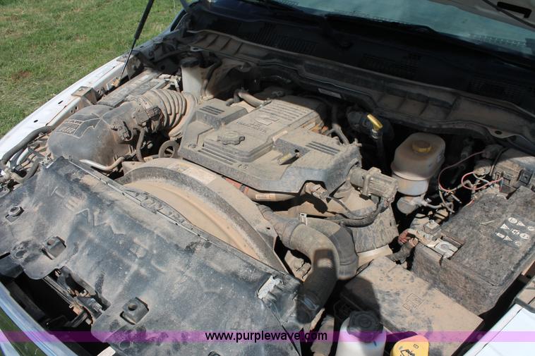 image for item K8914 2014 Dodge Ram 3500HD Quad Cab flatbed pickup truck