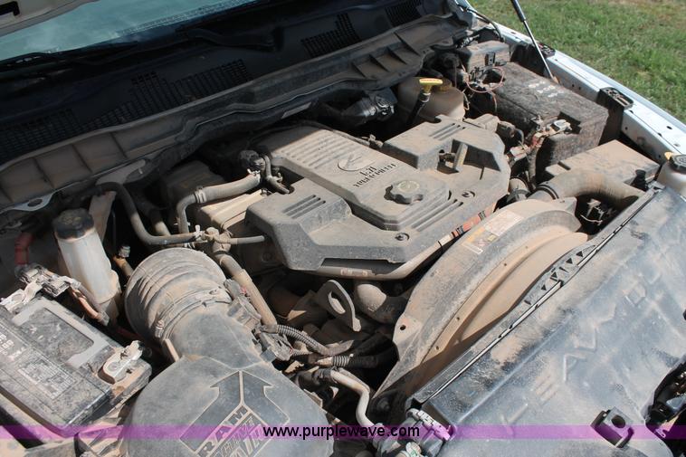 image for item K8914 2014 Dodge Ram 3500HD Quad Cab flatbed pickup truck