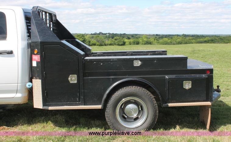 image for item K8914 2014 Dodge Ram 3500HD Quad Cab flatbed pickup truck