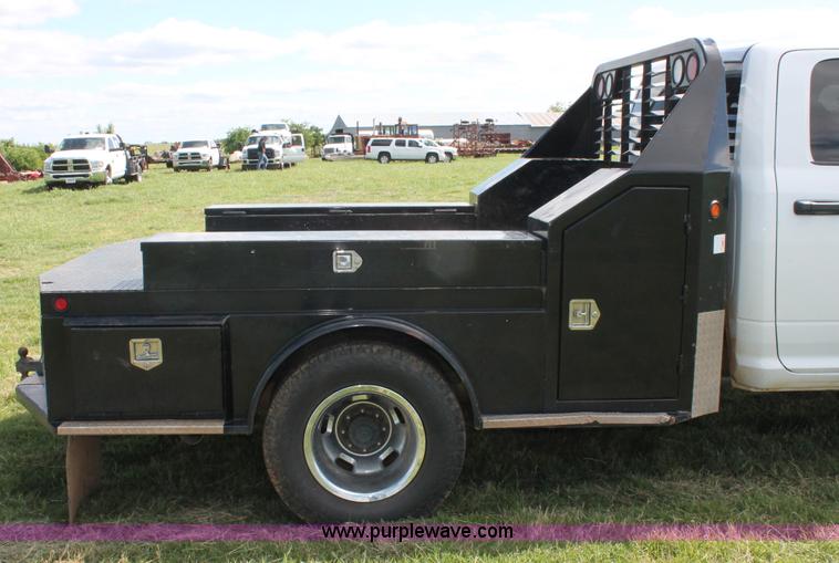 image for item K8914 2014 Dodge Ram 3500HD Quad Cab flatbed pickup truck