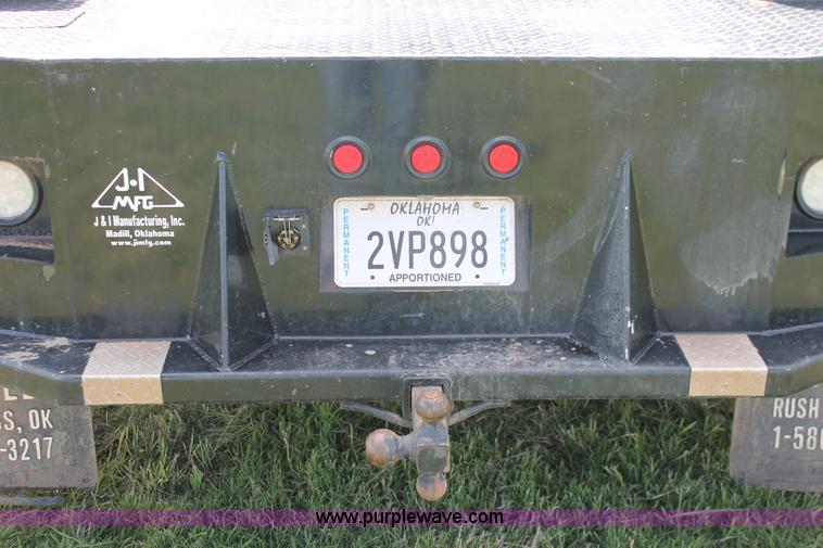 image for item K8914 2014 Dodge Ram 3500HD Quad Cab flatbed pickup truck