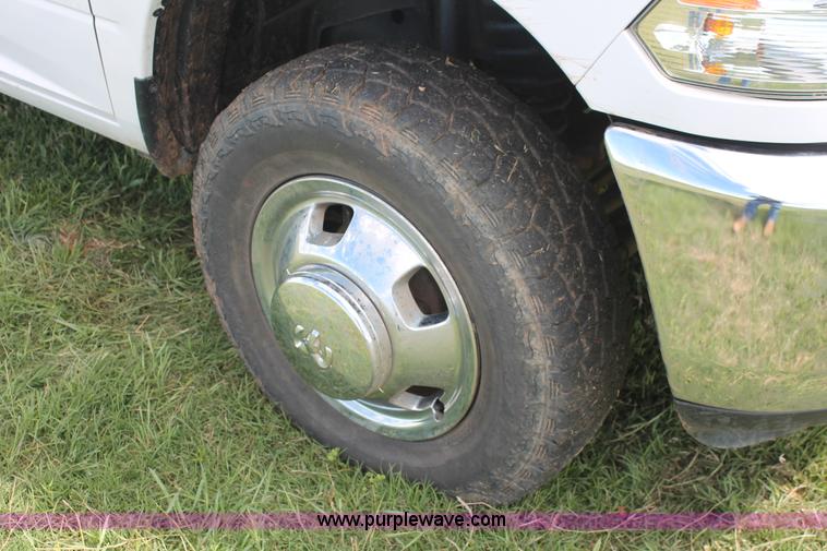 image for item K8914 2014 Dodge Ram 3500HD Quad Cab flatbed pickup truck