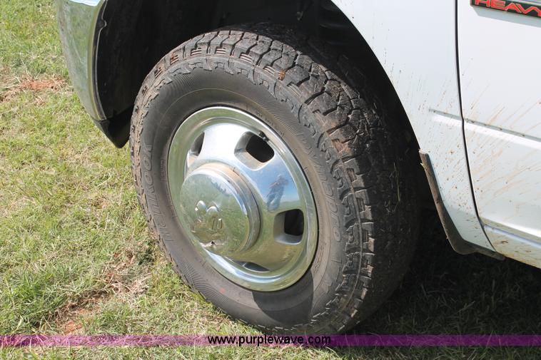 image for item K8914 2014 Dodge Ram 3500HD Quad Cab flatbed pickup truck