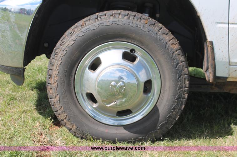 image for item K8914 2014 Dodge Ram 3500HD Quad Cab flatbed pickup truck