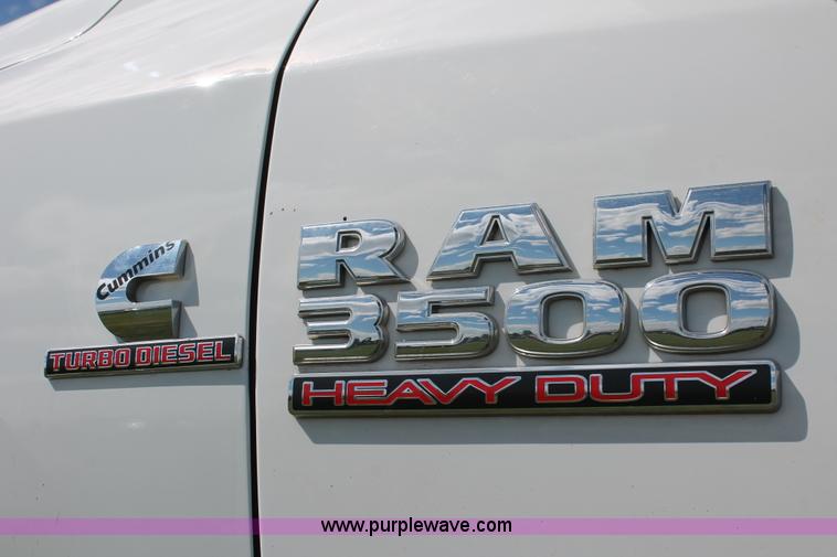 image for item K8914 2014 Dodge Ram 3500HD Quad Cab flatbed pickup truck