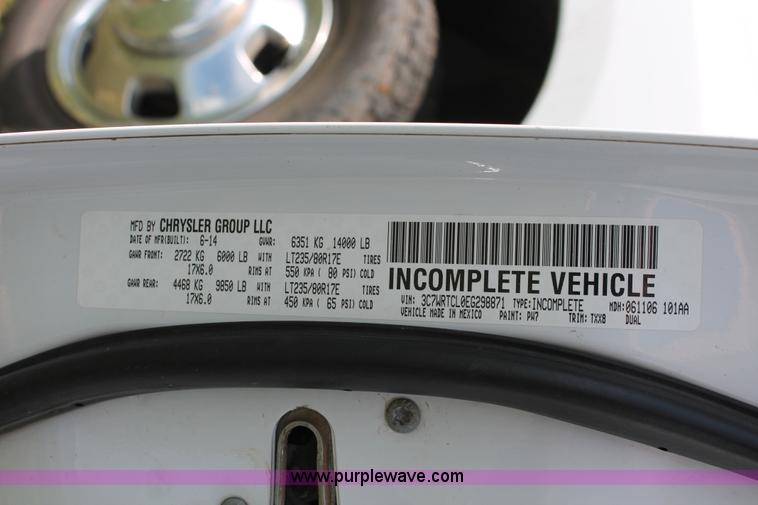 image for item K8914 2014 Dodge Ram 3500HD Quad Cab flatbed pickup truck