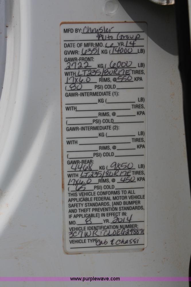 image for item K8914 2014 Dodge Ram 3500HD Quad Cab flatbed pickup truck