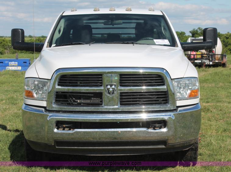 image for item K8915 2011 Dodge Ram 3500HD Quad Cab flatbed pickup truck