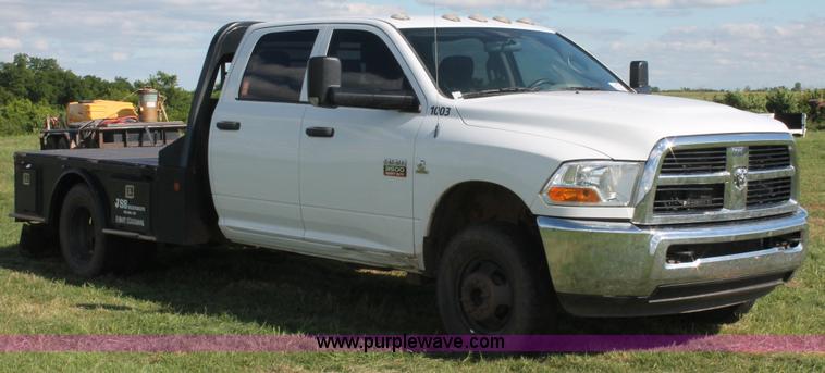 image for item K8915 2011 Dodge Ram 3500HD Quad Cab flatbed pickup truck