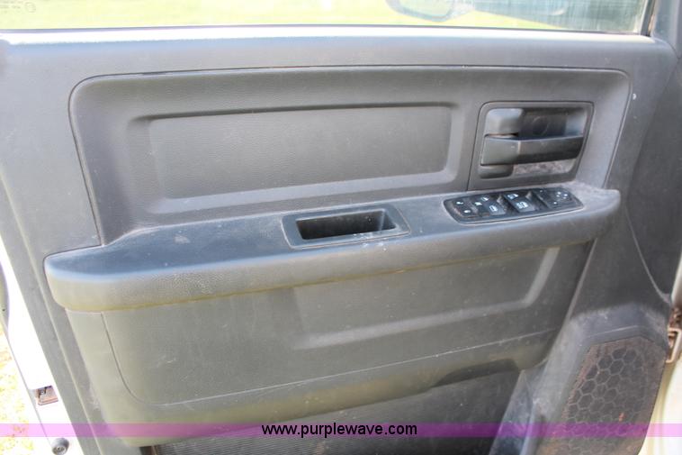 image for item K8915 2011 Dodge Ram 3500HD Quad Cab flatbed pickup truck