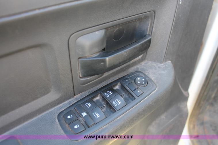 image for item K8915 2011 Dodge Ram 3500HD Quad Cab flatbed pickup truck